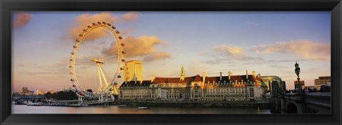 Framed Ferris wheel with buildings at waterfront, Millennium Wheel, London County Hall, Thames River, South Bank, London, England Print