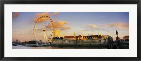 Framed Ferris wheel with buildings at waterfront, Millennium Wheel, London County Hall, Thames River, South Bank, London, England Print