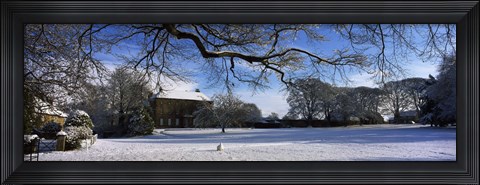 Framed Snow covered village, Crakehall, North Yorkshire, England Print