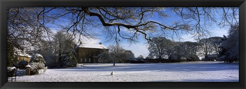 Framed Snow covered village, Crakehall, North Yorkshire, England Print