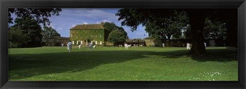 Framed Cricket match on the green at Crakehall, Bedale, North Yorkshire, England Print