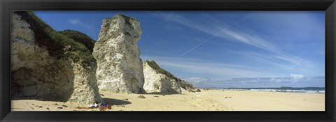 Framed Rock formations on the beach, White Rock Bay, Portrush, County Antrim, Northern Ireland Print