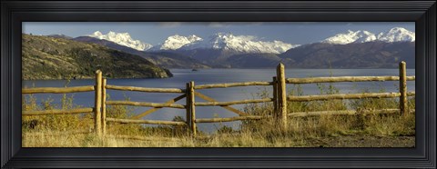 Framed Fence in front of a lake with mountains in the background, Lake General Carrera, Andes, Patagonia, Chile Print