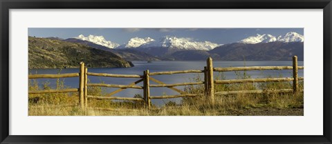 Framed Fence in front of a lake with mountains in the background, Lake General Carrera, Andes, Patagonia, Chile Print