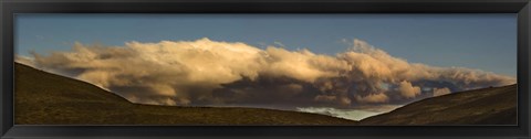 Framed Clouds over a hill Print