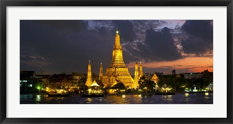 Framed Buddhist temple lit up at dawn, Wat Arun, Chao Phraya River, Bangkok, Thailand Print