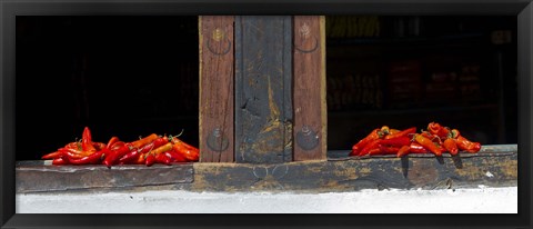 Framed Red chilies drying on window sill, Paro, Bhutan Print