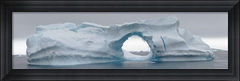Framed Blue iceberg with hole, Antarctica Print
