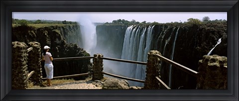 Framed Woman looking at the Victoria Falls from a viewing point, Zambia Print