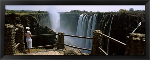 Framed Woman looking at the Victoria Falls from a viewing point, Zambia Print