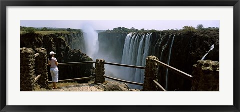 Framed Woman looking at the Victoria Falls from a viewing point, Zambia Print