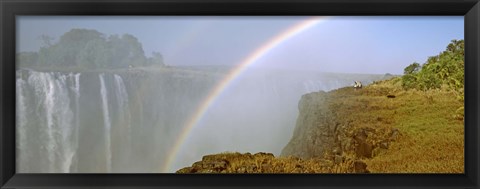 Framed Rainbow form in the spray created by the water cascading over the Victoria Falls, Zimbabwe Print