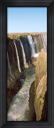 Framed Water falling through rocks in a river, Victoria Falls, Zimbabwe Print