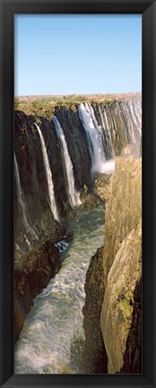 Framed Water falling through rocks in a river, Victoria Falls, Zimbabwe Print