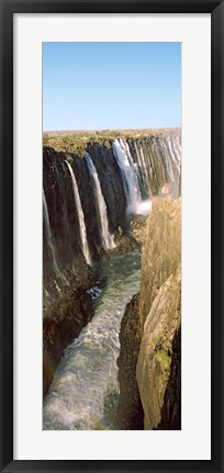 Framed Water falling through rocks in a river, Victoria Falls, Zimbabwe Print