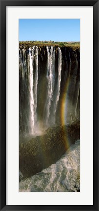 Framed Rainbow forms in the water spray in the gorge at Victoria Falls, Zimbabwe Print