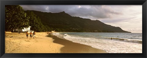 Framed People walking along the Beau Vallon beach, Mahe Island, Seychelles Print