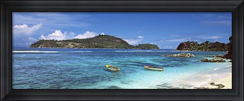 Framed Small fishing boats on Anse L&#39;Islette with Therese Island in background, Seychelles Print