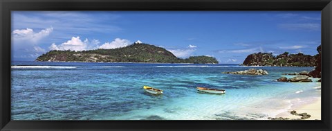 Framed Small fishing boats on Anse L&#39;Islette with Therese Island in background, Seychelles Print