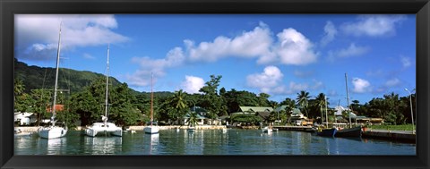 Framed Yachts and small fishing boats at the harbor on La Digue Island, Seychelles Print