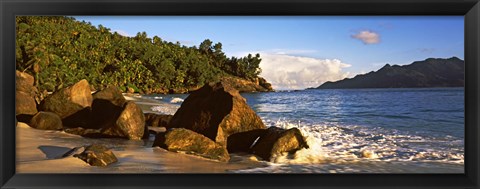 Framed Waves splashing onto rocks on North Island with Silhouette Island in the background, Seychelles Print