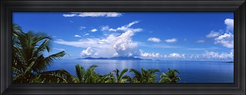 Framed Indian ocean with palm trees towards Mahe Island looking from North Island, Seychelles Print