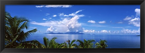 Framed Indian ocean with palm trees towards Mahe Island looking from North Island, Seychelles Print