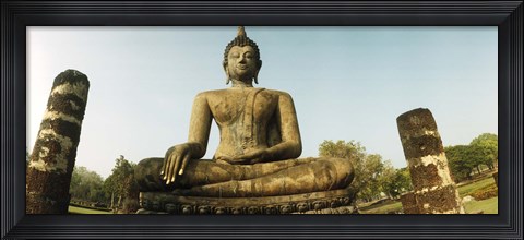 Framed Low angle view of a statue of Buddha, Sukhothai Historical Park, Sukhothai, Thailand Print