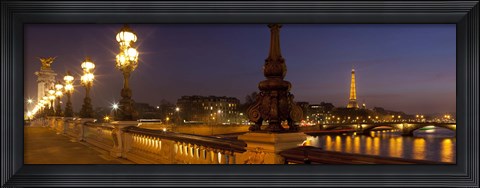 Framed Bridge across the river lit up at dusk, Pont Alexandre III, Seine River, Paris, Ile-De-France, France Print