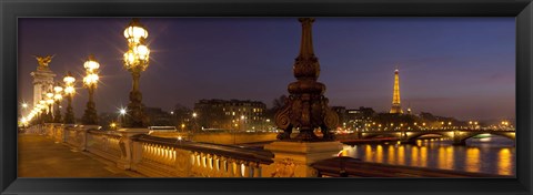 Framed Bridge across the river lit up at dusk, Pont Alexandre III, Seine River, Paris, Ile-De-France, France Print