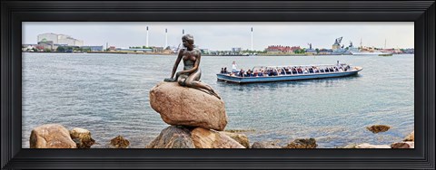 Framed Little Mermaid Statue with tourboat in a canal, Copenhagen, Denmark Print