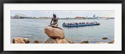 Framed Little Mermaid Statue with tourboat in a canal, Copenhagen, Denmark Print