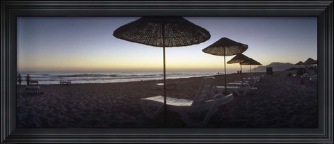 Framed Beach chairs and straw sun umbrellas on Patara Beach on the Mediterranean Sea at sunset, Patara, Antalya Province, Turkey Print