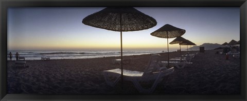 Framed Beach chairs and straw sun umbrellas on Patara Beach on the Mediterranean Sea at sunset, Patara, Antalya Province, Turkey Print