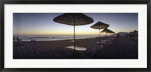 Framed Beach chairs and straw sun umbrellas on Patara Beach on the Mediterranean Sea at sunset, Patara, Antalya Province, Turkey Print