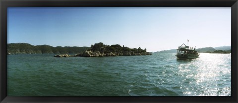 Framed Rocky island and boat in the Mediterranean sea, Sunken City, Kekova, Antalya Province, Turkey Print