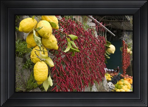 Framed Close-up of lemons and chili peppers in a market stall, Sorrento, Naples, Campania, Italy Print