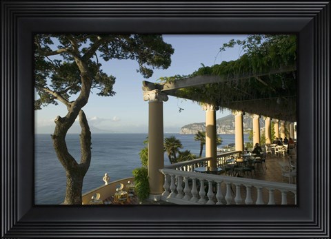 Framed Group of people sitting in a restaurant by the sea, Imperial Tramontano, Sorrento, Naples, Campania, Italy Print