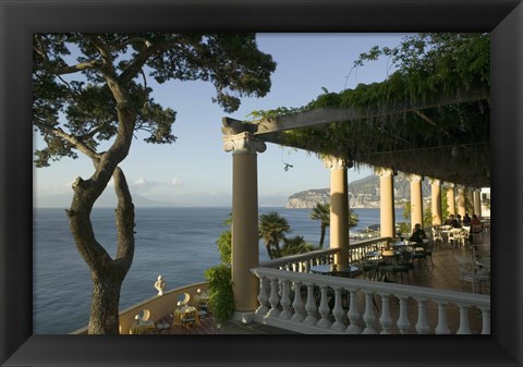 Framed Group of people sitting in a restaurant by the sea, Imperial Tramontano, Sorrento, Naples, Campania, Italy Print
