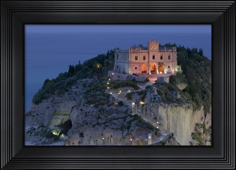 Framed High angle view of a church lit up at dusk on a cliff, Santa Maria dell Isola, Tropea, Calabria, Italy Print