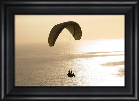 Framed Silhouette of a paraglider flying over an ocean, Pacific Ocean, San Diego, California, USA Print
