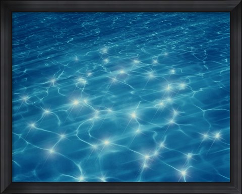 Framed Dancing lights under deep blue water Print