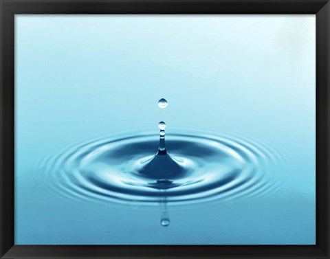 Framed Drops rising from ripples in blue water Print
