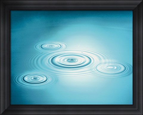 Framed Multiple rings in blue water with bright light reflection Print