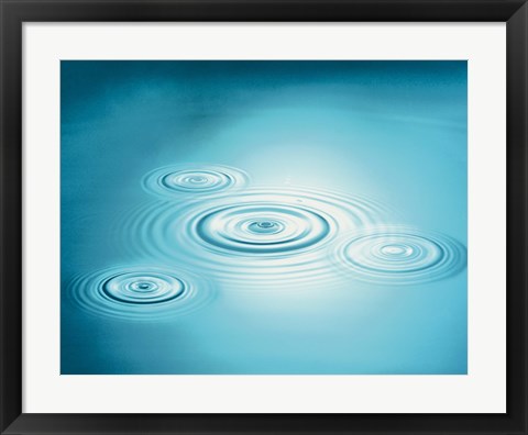 Framed Multiple rings in blue water with bright light reflection Print