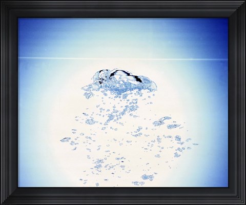 Framed Churning bubbles rising upwards with bright light background Print