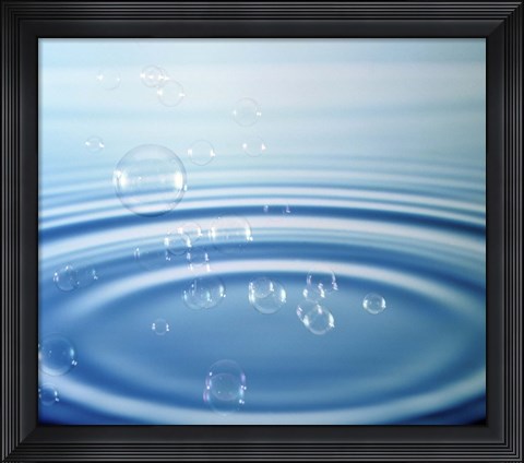 Framed Large rings in blue water with bubbles Print