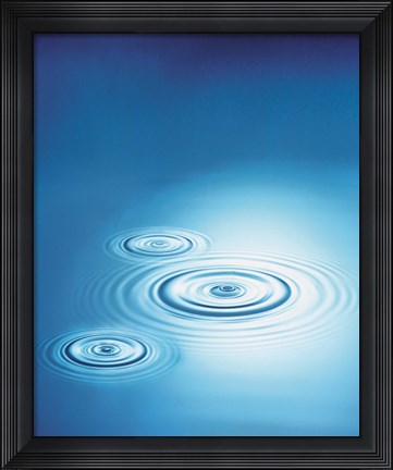 Framed Three rings in blue water with bright light reflection Print