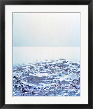 Framed Churning water bubbles in bright light Print