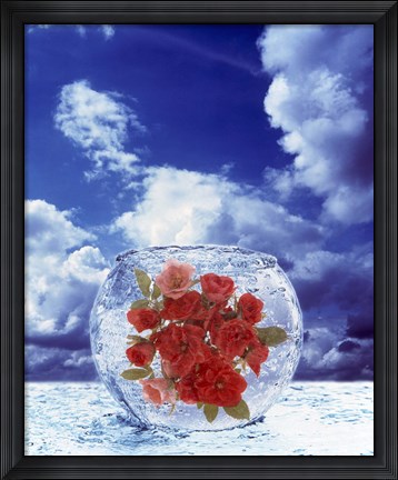 Framed Crystal round vase filled with ice and red roses resting on seashore with blue sky and white clouds Print